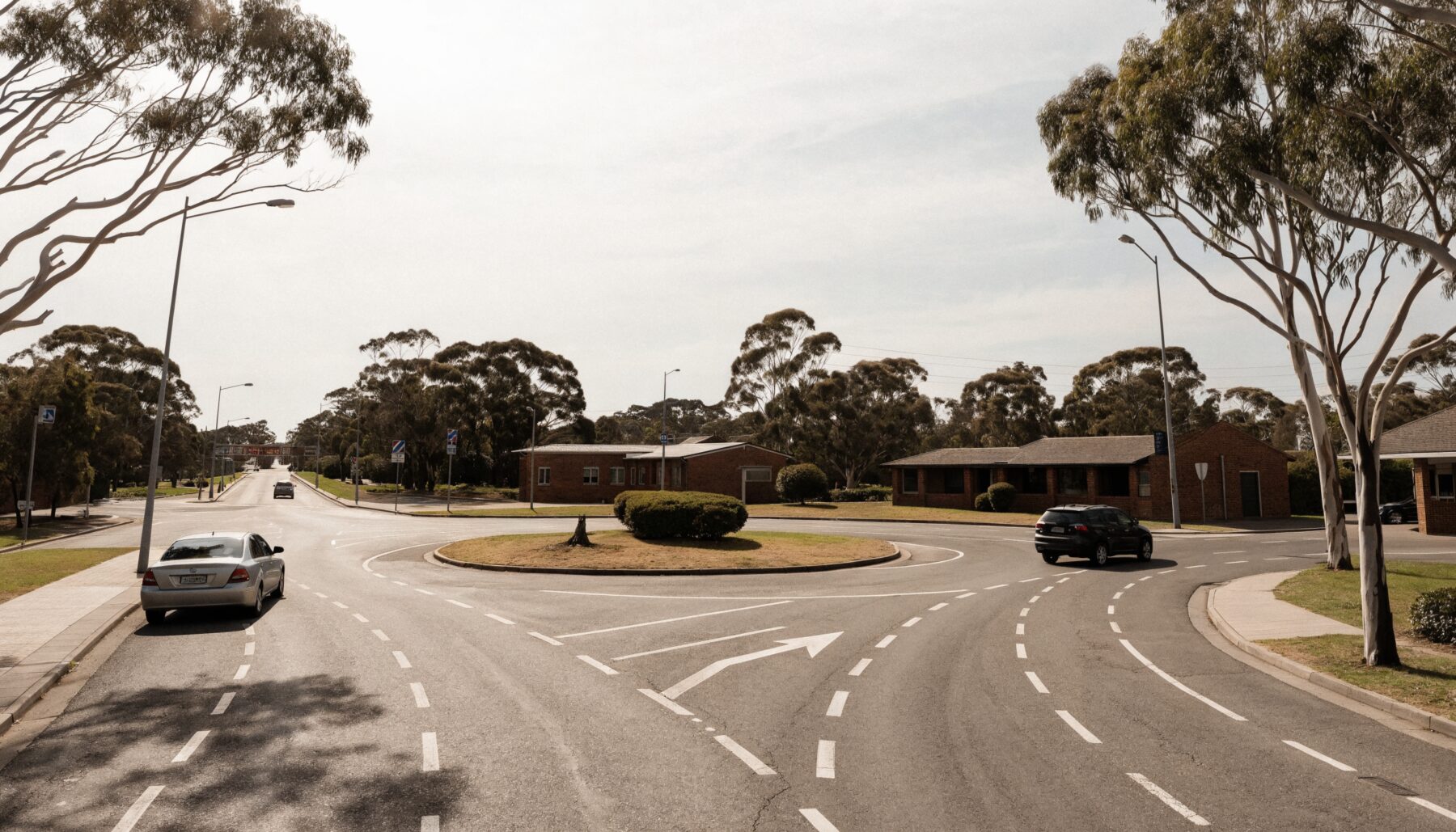 Suburban Melbourne roundabout with clear lane markings used for manual driving lesson practice